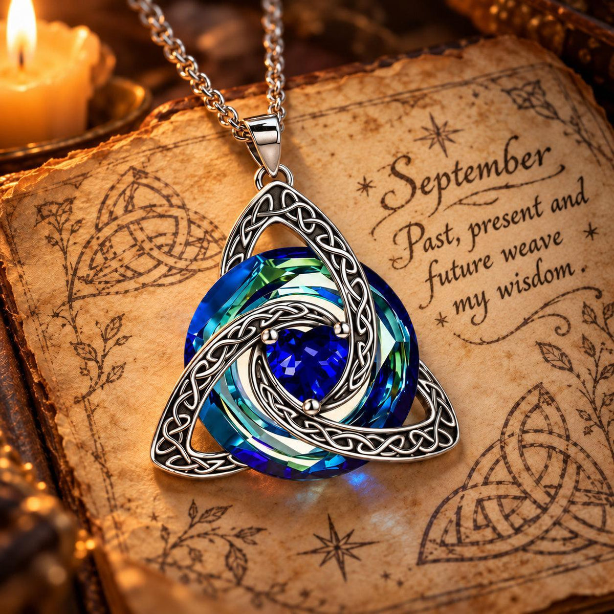 September Celtic Trinity Knot Birthstone Necklace on parchment — Past, present and future weave my wisdom.