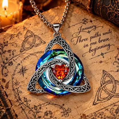 January Celtic Trinity Knot Birthstone Necklace on parchment — Three paths unite in one brave beginning.