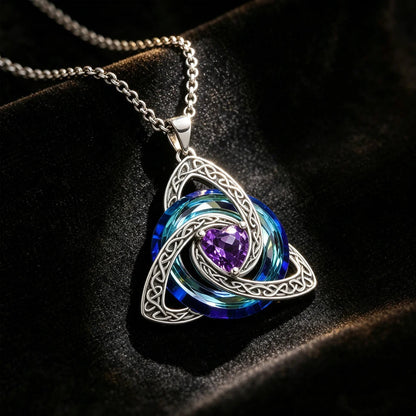 Celtic trinity knot necklace with a zirconia heart pendant