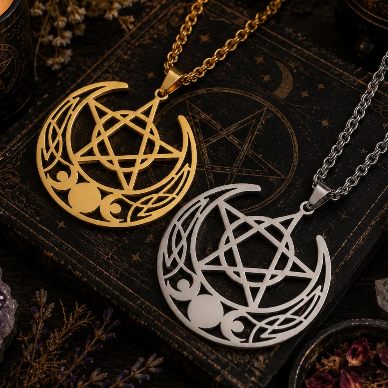 Gold and silver stainless steel Celtic Triple Moon Pentagram necklaces on a dark, mystical book.