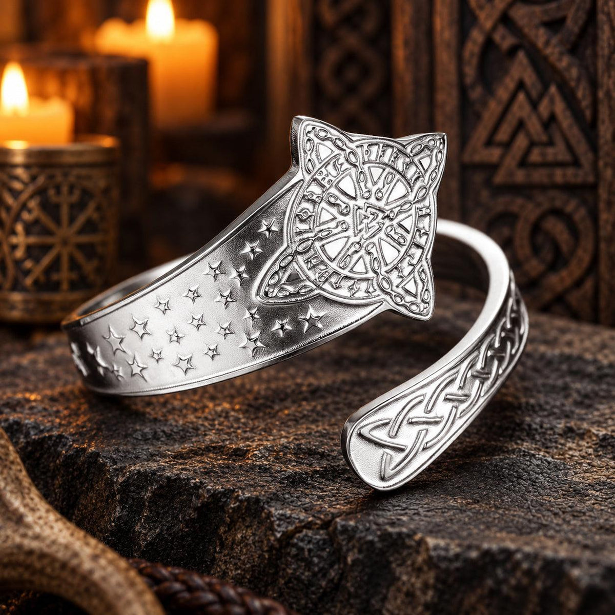 Celtic Witch Knot Ring with Triquetra & Rune Wheel Engraving in a dark pagan Viking altar setting, detailed polished metal finish