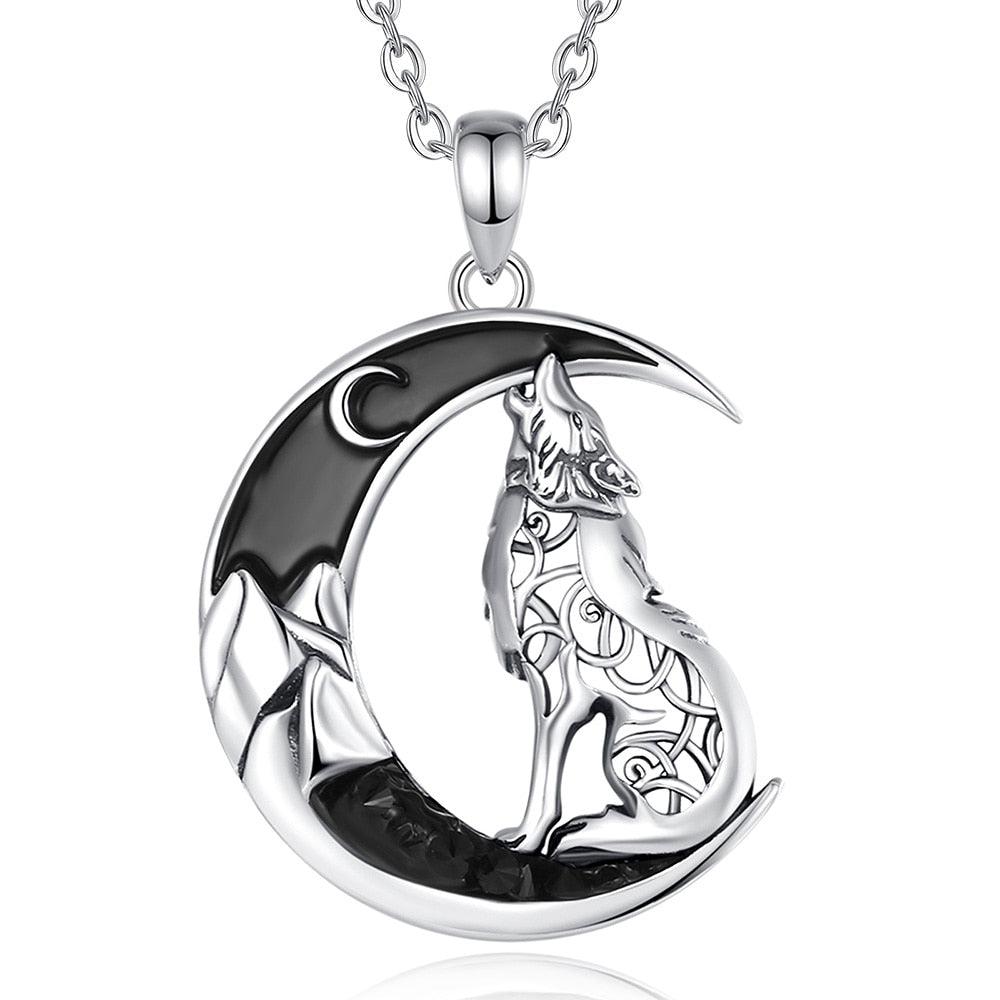 Sterling silver Celtic wolf howling at a black zircon moon necklace.