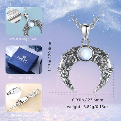 Exquisite 925 sterling silver Crescent Moon Necklace with a glowing gemstone, featuring intricate scrollwork.