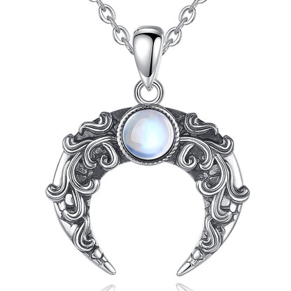 Exquisite 925 sterling silver Crescent Moon Necklace with a glowing round gemstone and intricate scrollwork.