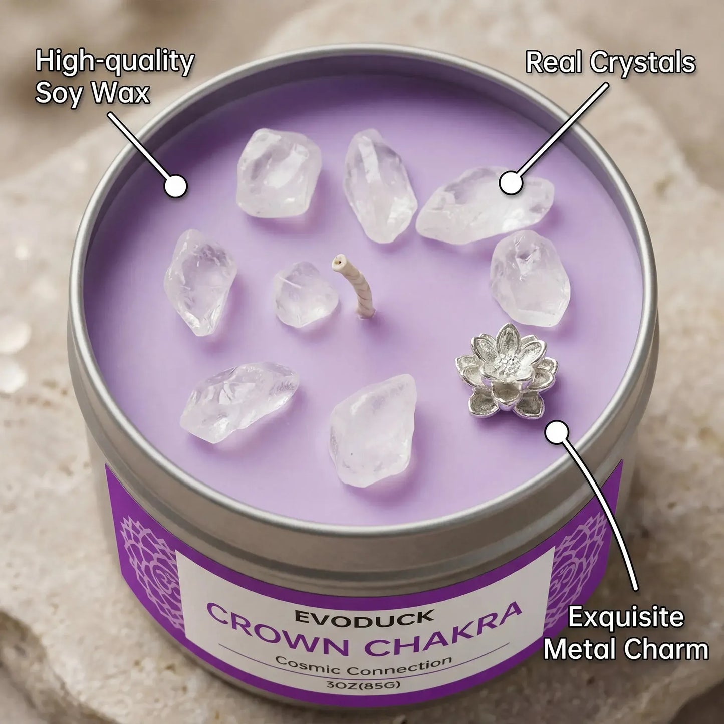 Crown Chakra candle close-up labeled with soy wax, real crystals, and metal lotus charm