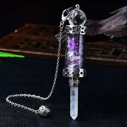 Glass chamber, crystal chips and pointed pendulum with chain: Crystal Chip Glass Bottle Divination Pendulum, featuring a crystal-chip glass bottle with an elongated point and chain.