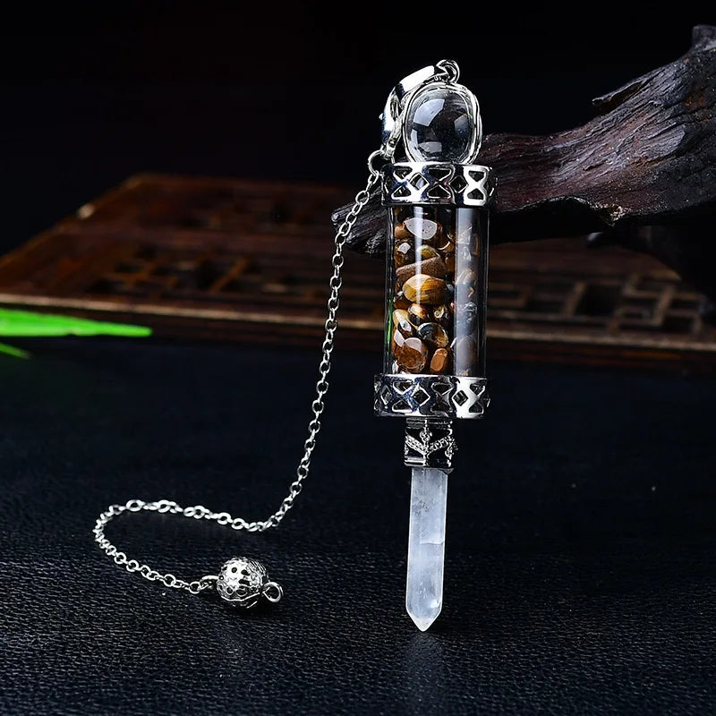 Glass chamber, crystal chips and pointed pendulum with chain: Crystal Chip Glass Bottle Divination Pendulum, featuring a crystal-chip glass bottle with an elongated point and chain.
