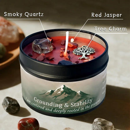 Grounding & Stability candle labeled with smoky quartz, red jasper crystals, and tree charm