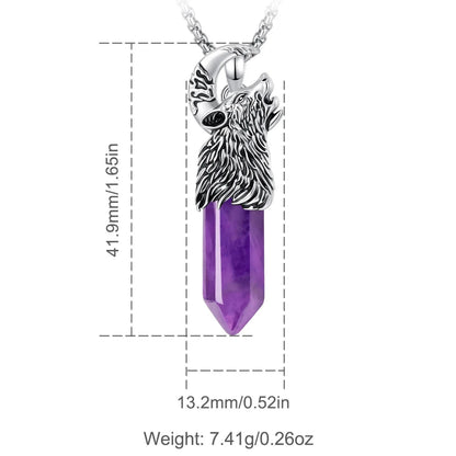 Wolf moon crystal pendant worn over a dark neckline