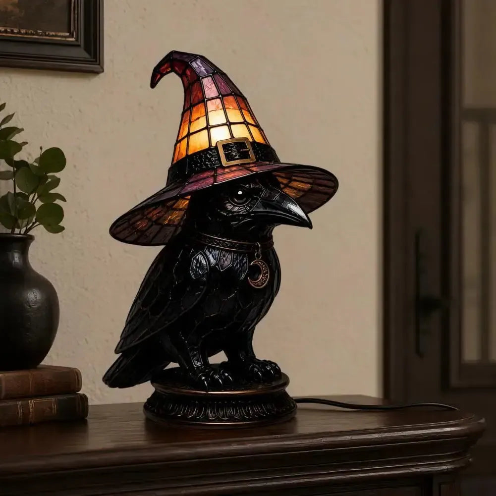 Dark academia raven witch hat night light on entryway table with books and plant