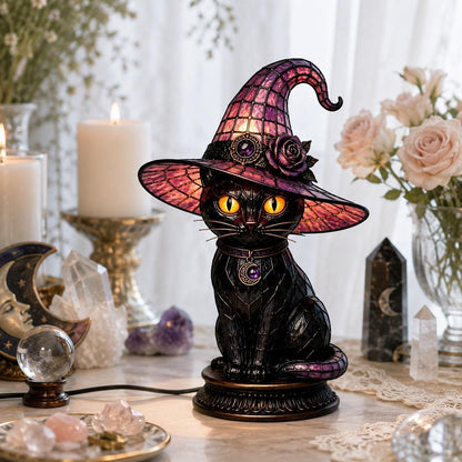 Dark academia black cat witch hat night light near roses and crystal decor