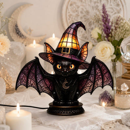Dark academia bat wing cat witch hat night light near candles and roses