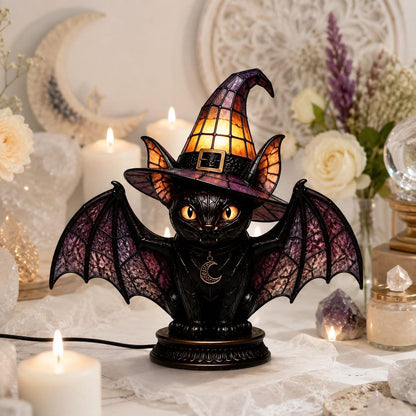 Dark academia bat wing cat witch hat night light near candles and roses