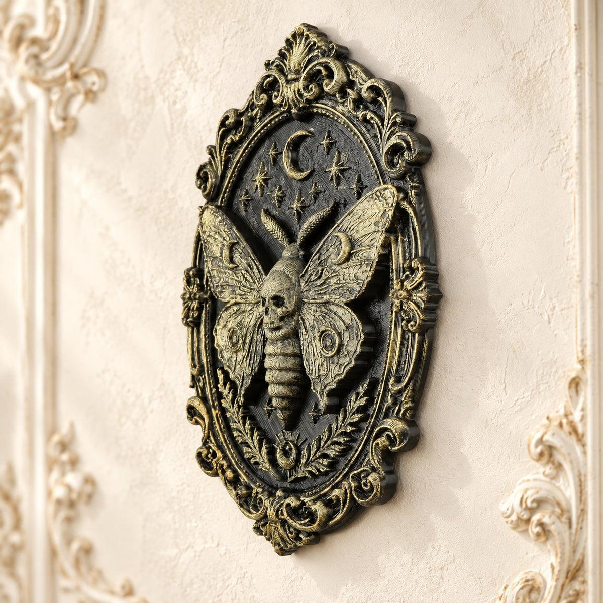 Death Head Moth Wall Decor Oval Baroque Frame Wall Art — view 2 showing carved details in a bright gothic vintage setting
