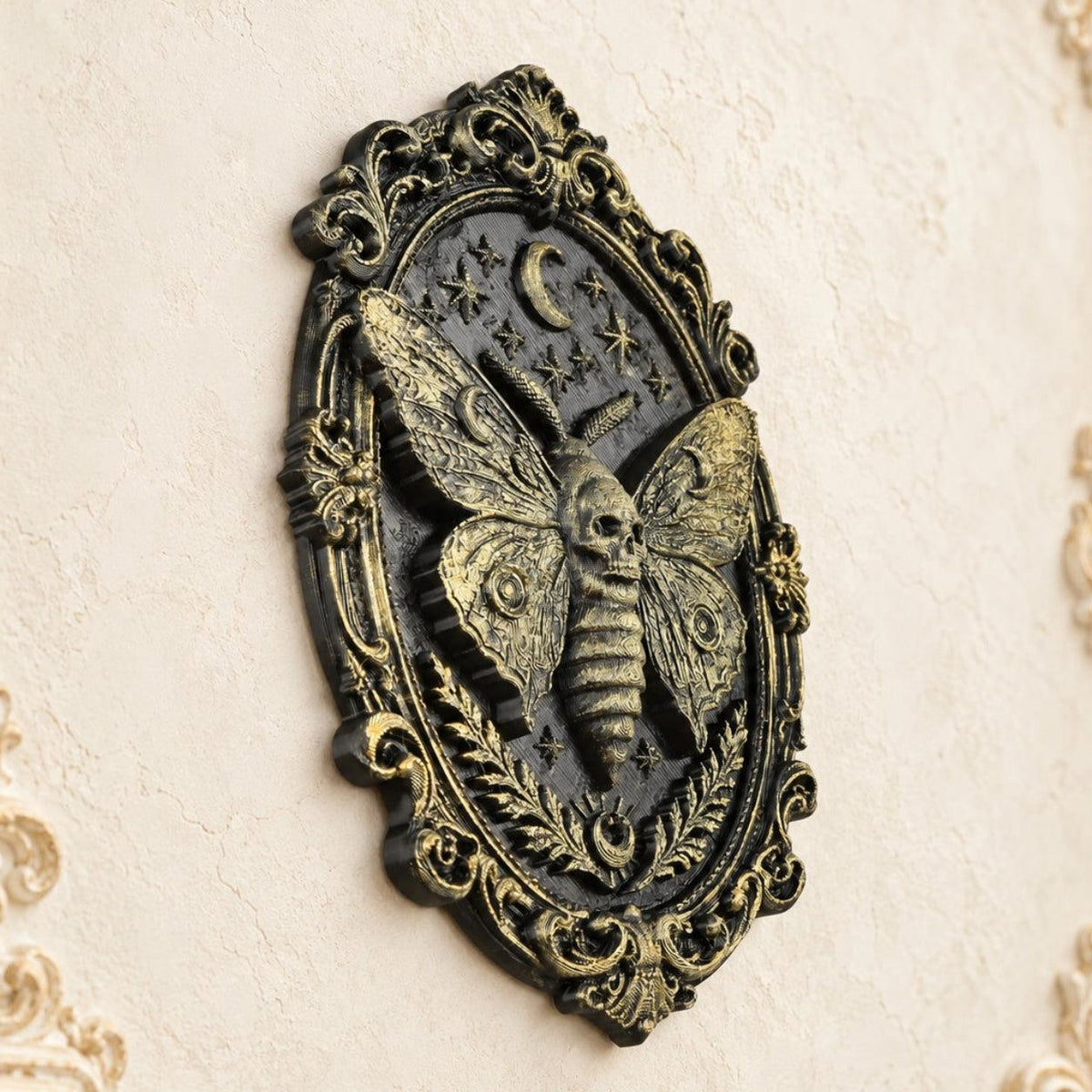 Death Head Moth Wall Decor Oval Baroque Frame Wall Art — view 3 showing carved details in a bright gothic vintage setting