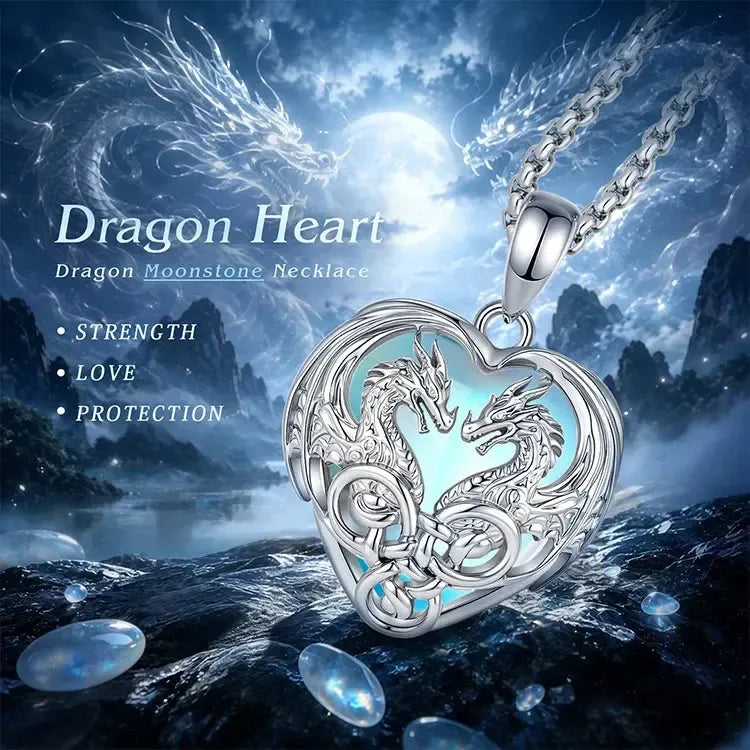 Double dragon necklace shown flat against a pale backdrop