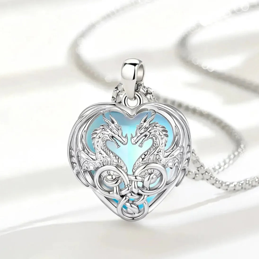 Celtic trinity knot framing detail on the dragon pendant