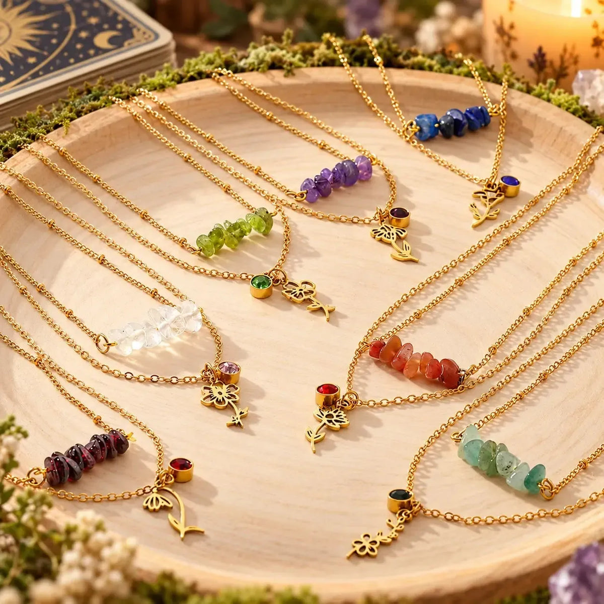 Layered botanical necklaces arranged on a light background