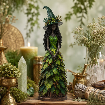 Green Forest Spell witch figurine on witchy altar table with crystals and herbs