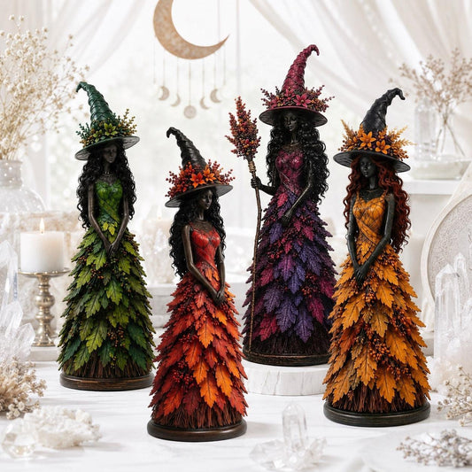 Autumn witch figurine set in green red purple and orange leaf dresses with moon decor