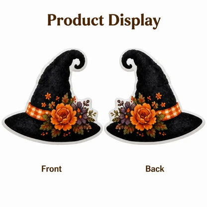 Front and back views: decorative plush pillow featuring witch hat with autumn flowers and stars