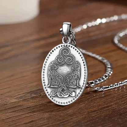 Close-up of the triskelion detail on the Freya amulet
