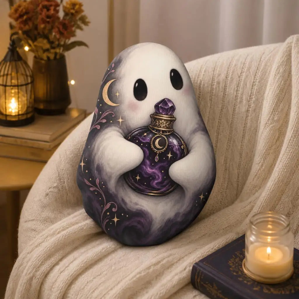 Styled room view: decorative plush pillow featuring ghost and crystal-ball artwork