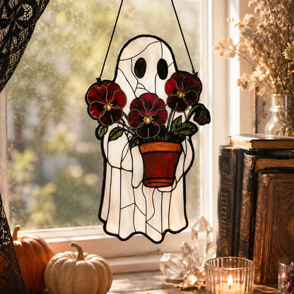 Ghost suncatcher styled in a kitchen window
