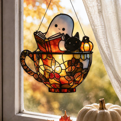 Ghost suncatcher hanging in a sunlit reading nook window