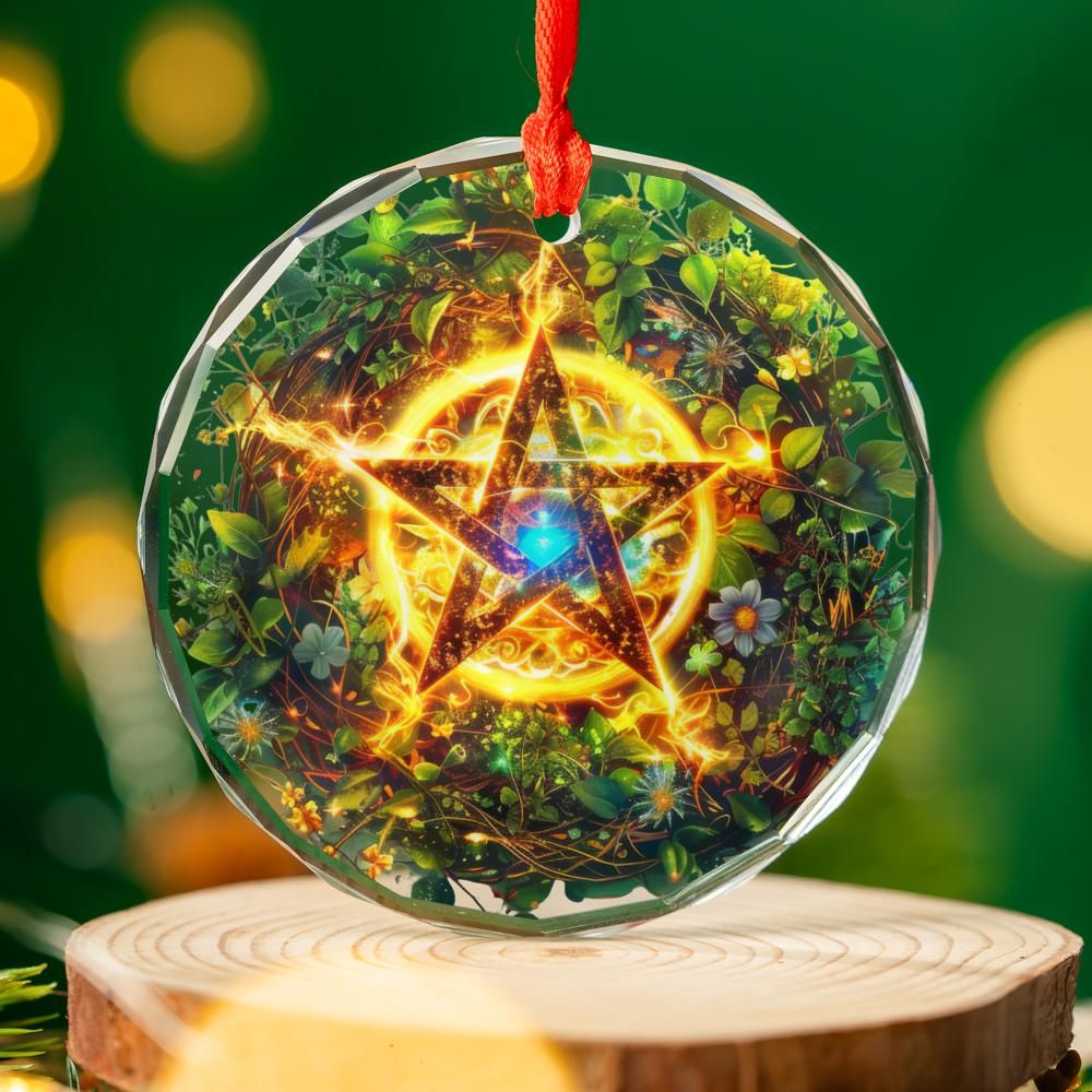 Clear glass pentagram ornament with glowing star, surrounded by green leaves and flowers, on a wood stand.