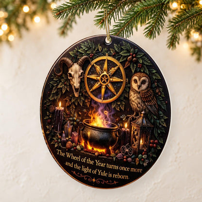 Gold Sun Wheel & Ram Skull Wicca and Pagan Yule Ceramic Ornament – Witchy Christmas Decoration — thin double-sided ceramic ornament, reverse-side right angled hanging view, identical double-sided print.