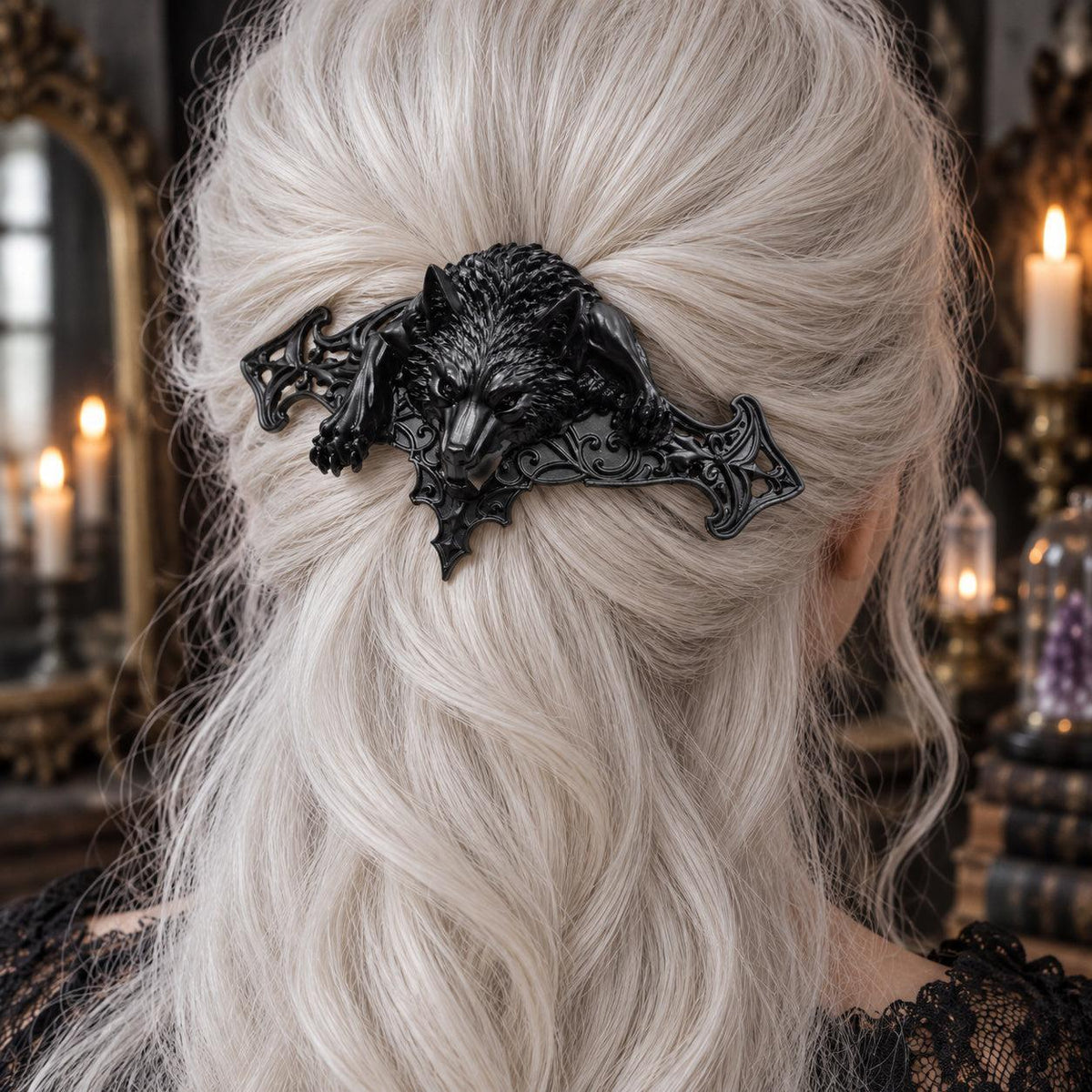 Black Wolf Hairpin in White Hair worn by a witch in a candlelit mystical room