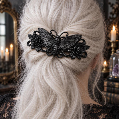 Death’s-head moth hairpin in white hair worn by a witch in a candlelit mystical room