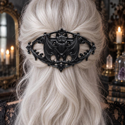 Ornate Bat Barrette in White Hair worn by a witch in a candlelit mystical room