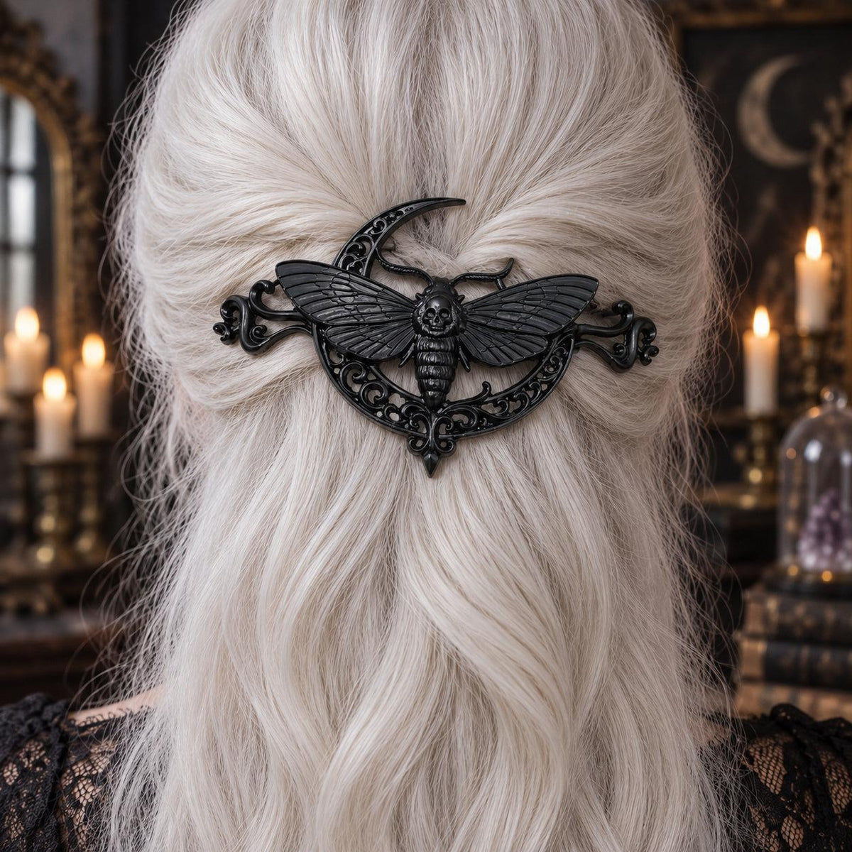 Black moth crescent hairpin in white hair worn by a witch in a candlelit mystical room