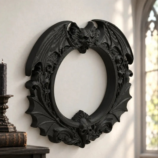 Dark bat skull wall frame front view with open circular center