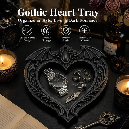 Styled jewelry display: Gothic Bat Wing Heart Jewelry Tray, featuring a heart-shaped center, outstretched bat wings and ornate raised scrollwork.