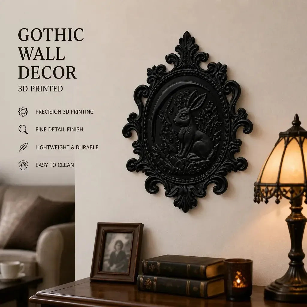 Styled on a wall beside books: Gothic Crescent Moon Hare Wall Plaque, featuring a woodland hare, crescent moon, botanical relief and an ornate oval frame.