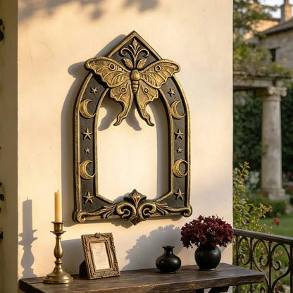 Styled outdoor wall display: Gothic Luna Moth Moon Wall Hanging, featuring a luna moth above an open Gothic arch, with crescent moons and stars.