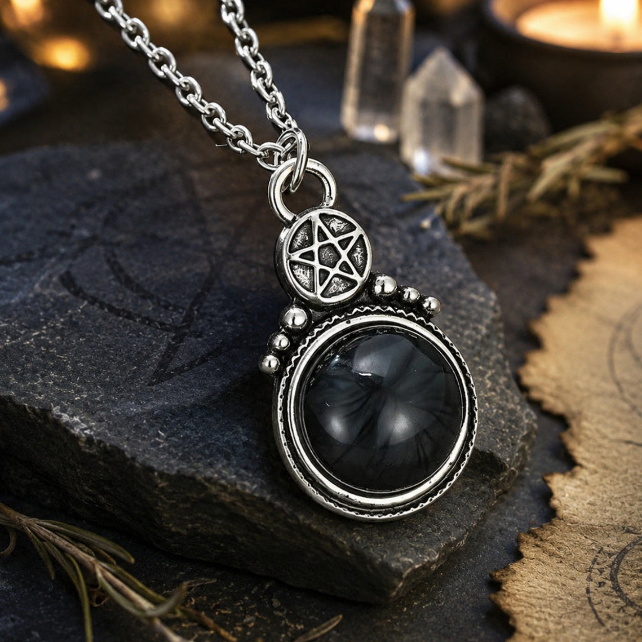 Antique silver pentagram necklace with dark round stone in Pagan ritual scene