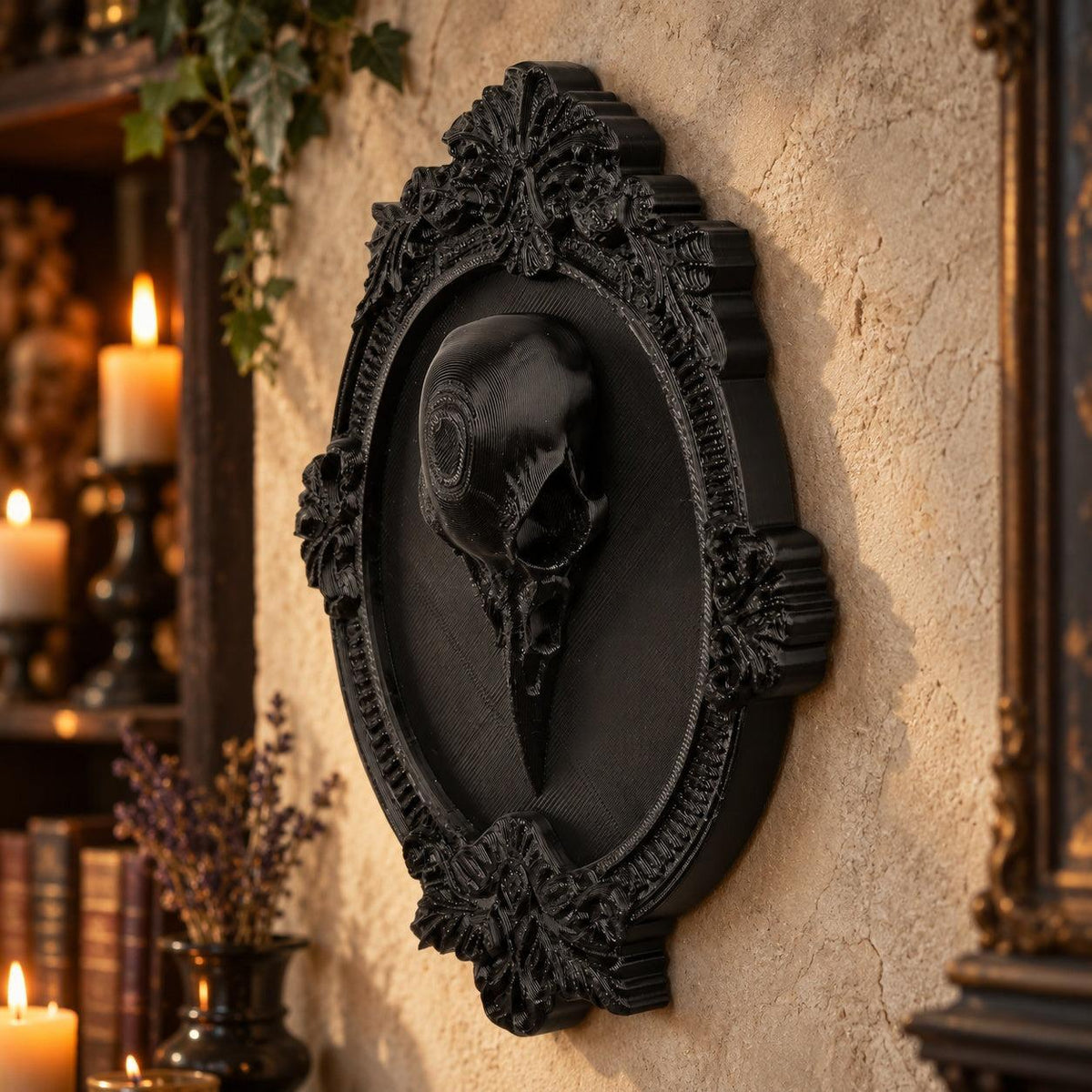 Angled view of dark skull relief: Gothic Raven Skull Wall Plaque, featuring a raven skull relief surrounded by an elaborate oval frame.