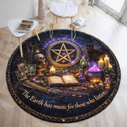Gothic black cat, skull, and pentacle round rug with "The Earth has music" text.