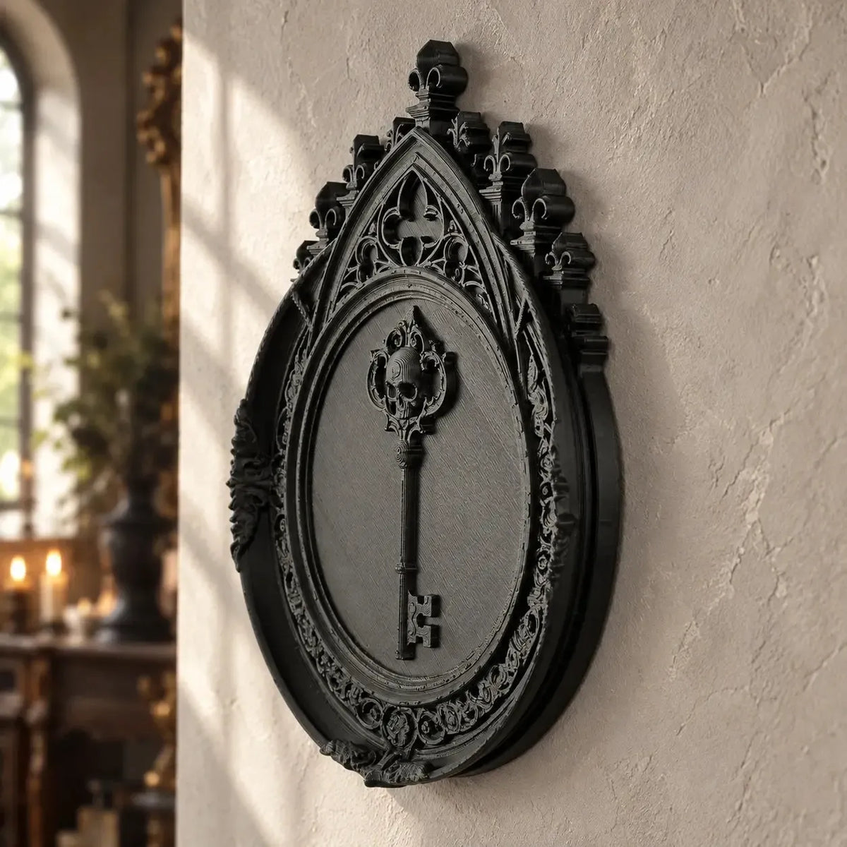 Skull key plaque angled view showing cathedral-style surround in a bright gothic room