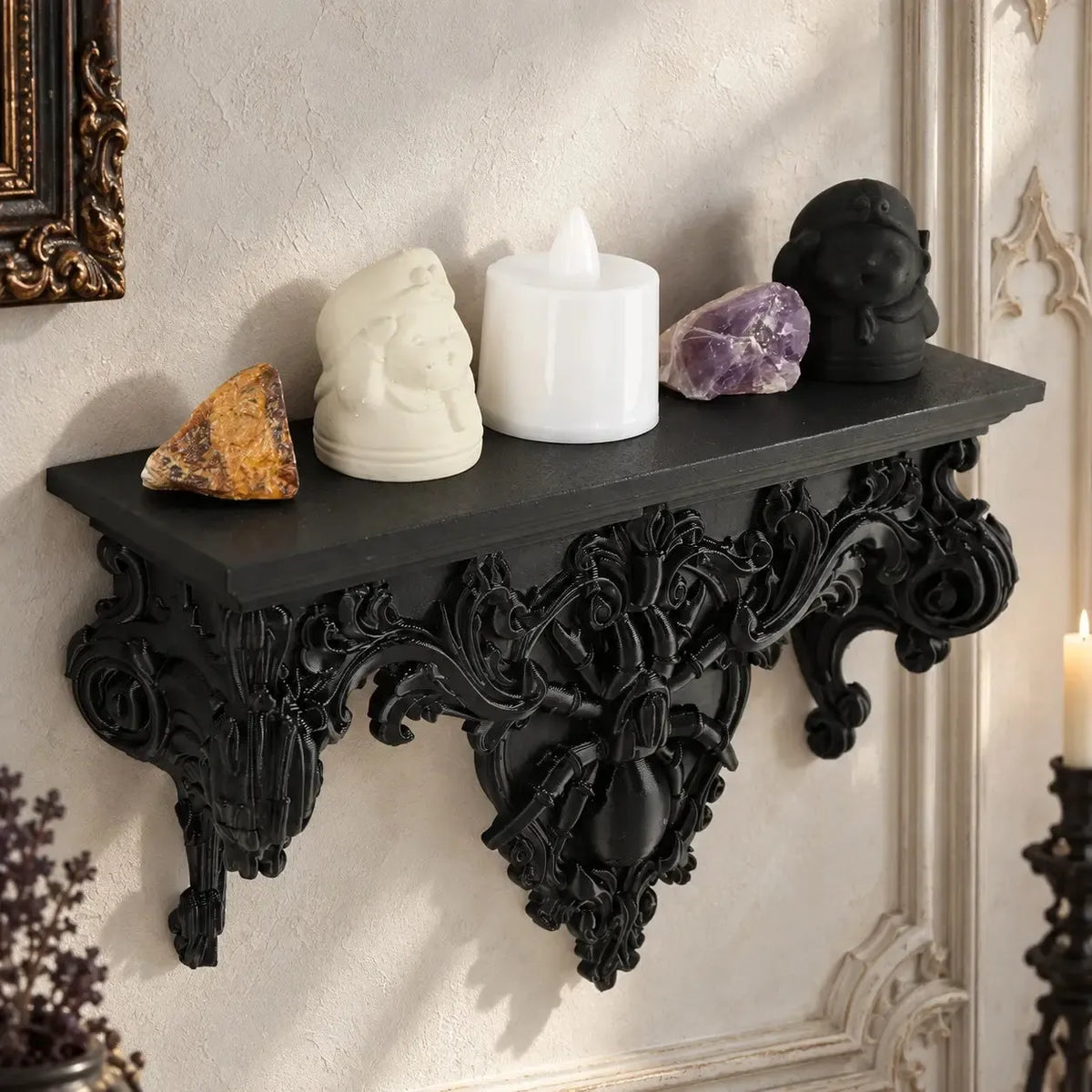 Spider wall shelf displaying small crystals and figurines in a bright gothic room