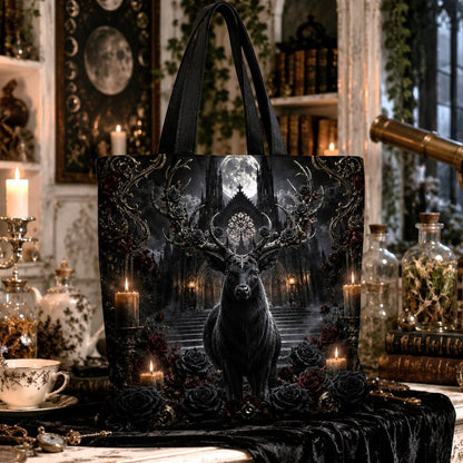 Gothic tote bag design featuring a stag with large antlers adorned with roses, standing before gothic castle stairs, full moon, candles and roses.