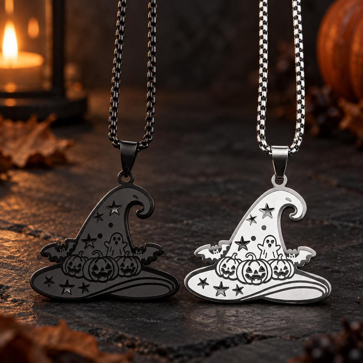 Black and silver Gothic Witch Hat Halloween Necklaces displayed together on dark stone with candlelit autumn decor.