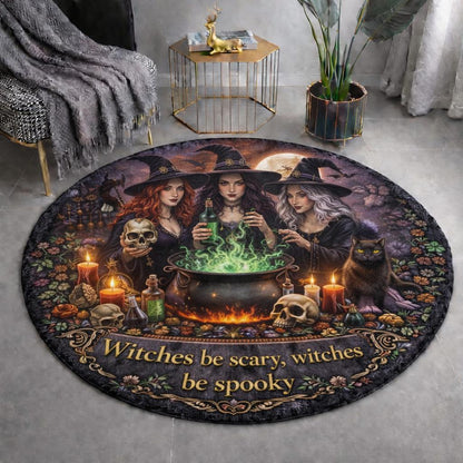 Round black flannel rug with three witches, a cauldron, skulls, candles, and a black cat.