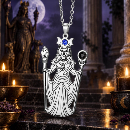 Greek Hecate Goddess Pendant Necklace in Stainless Steel in a dark Greek goddess altar setting, detailed polished metal finish