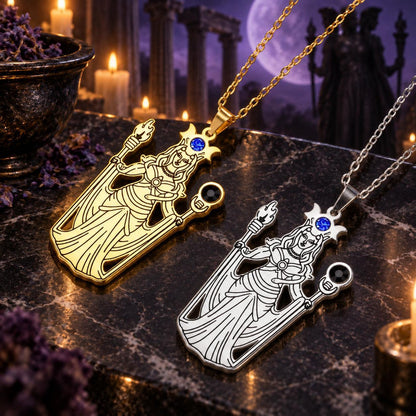 Greek Hecate Goddess Pendant Necklace in Stainless Steel in a dark Greek goddess altar setting, detailed polished metal finish