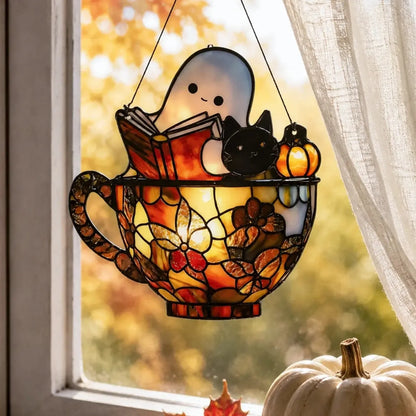 Ghost suncatcher hanging in a sunlit reading nook window